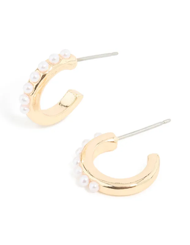Gold Pearl Huggie Earrings sold by lovisa
