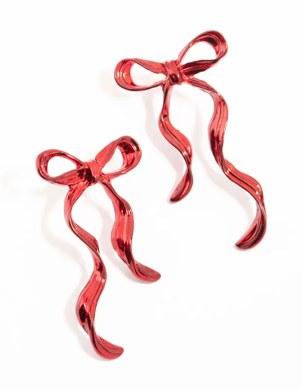Red Coated Metal Dangle Bow Stud Earrings sold by lovisa