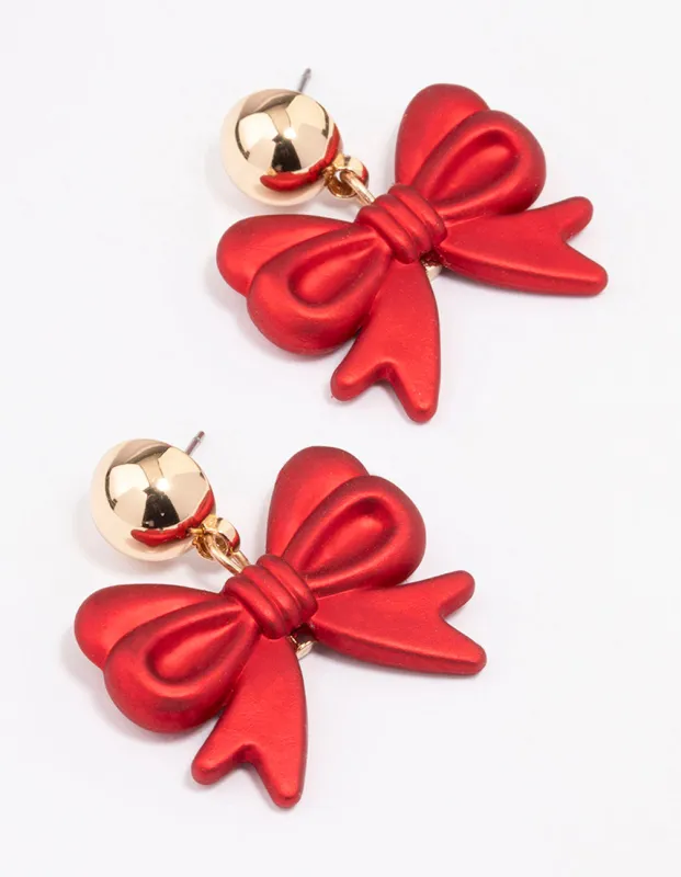 Gold Red Pearlised Bow Earrings sold by lovisa