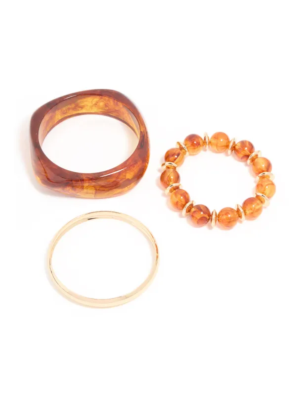 Gold & Brown Acrylic Brown Bangles 3-Pack sold by lovisa