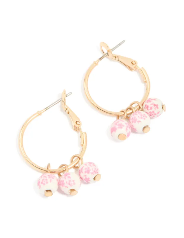 Gold Mini Hand-Painted Pink Floral Ball Hoop Earrings sold by lovisa