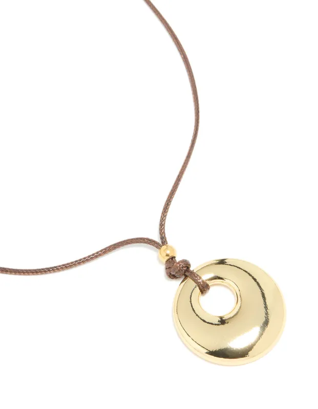 Waterproof Gold Plated Stainless Steel Circle Pendant Brown Cord Necklace sold by lovisa