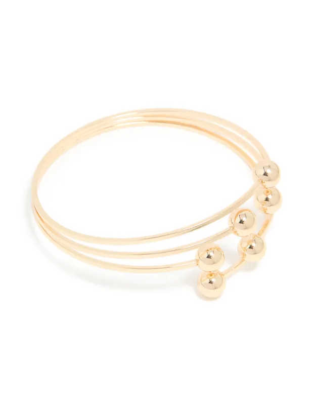 Gold Ball Layered Bangle sold by lovisa