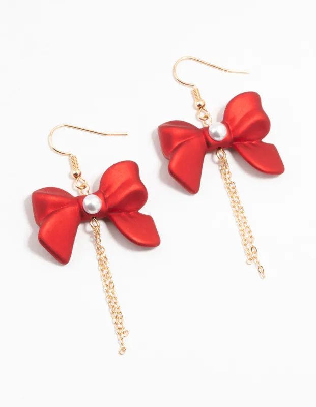 Gold Pearlised Red Bow Chain Drop Earrings sold by lovisa