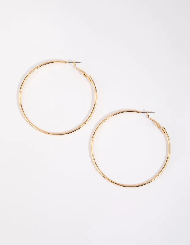 Gold Plain Rounded Hoop Earrings sold by lovisa