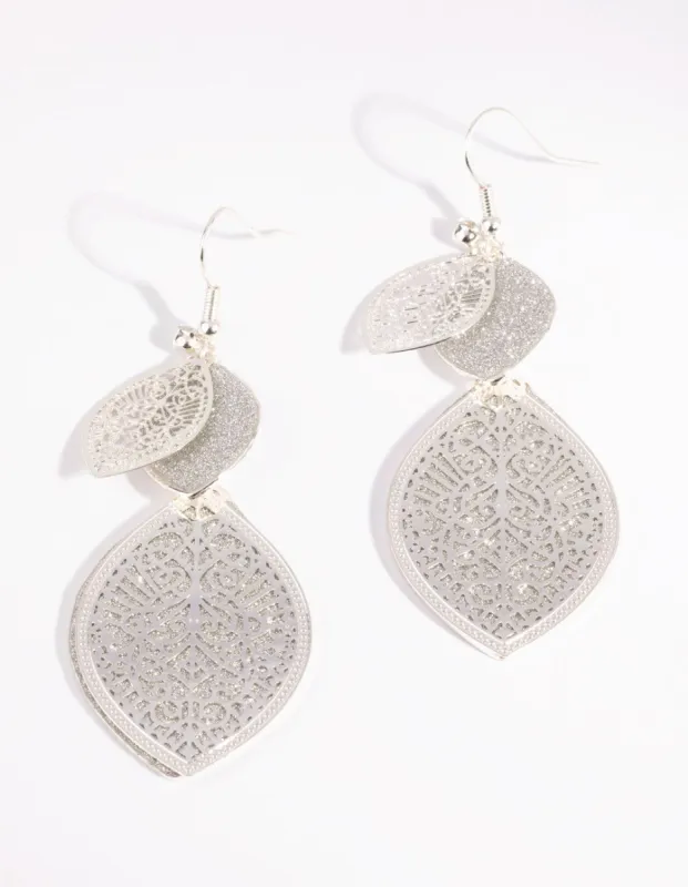 Silver Glitter Leaf Earrings sold by lovisa