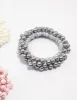 Beaded Pearl Cluster Hair Ties 3-Pack sold by lovisa