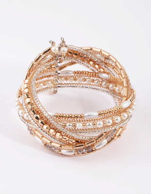 Gold Pearl Cross Over Cuff Bangle sold by lovisa