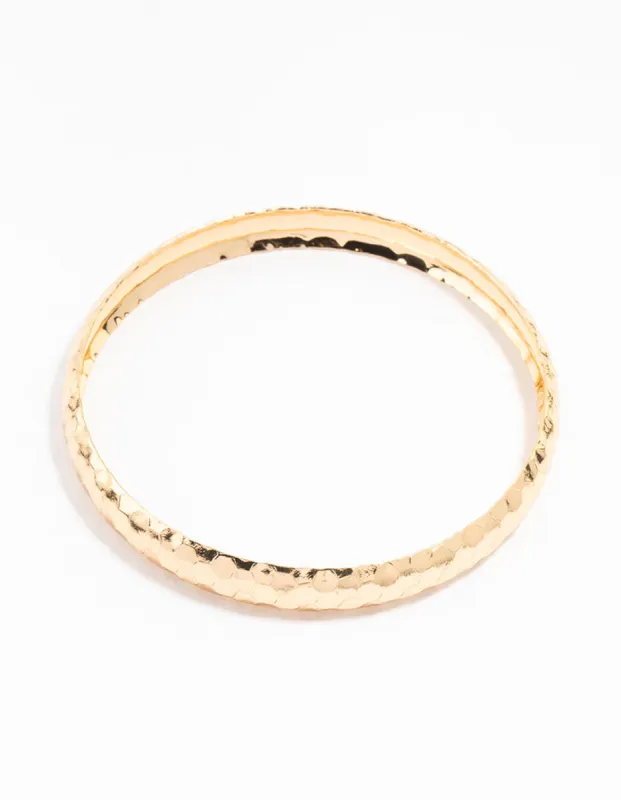 Gold Thin Hammered Bangle sold by lovisa