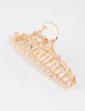 Gold Pearl & Flower Claw Clip sold by lovisa