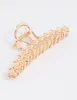 Gold Pearl & Flower Claw Clip sold by lovisa