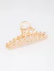 Gold Pearl & Flower Claw Clip sold by lovisa