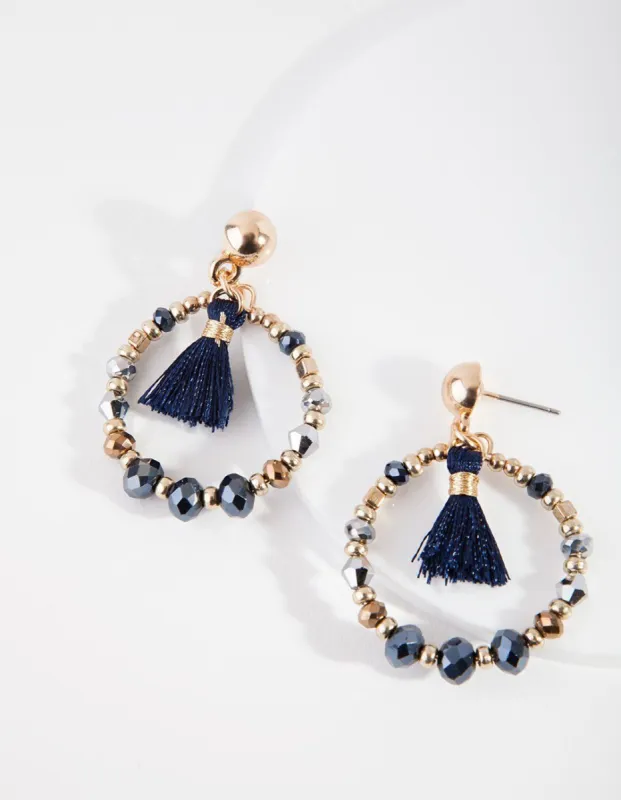 MIDN SG BD CIRC TASSL DRP ER sold by lovisa