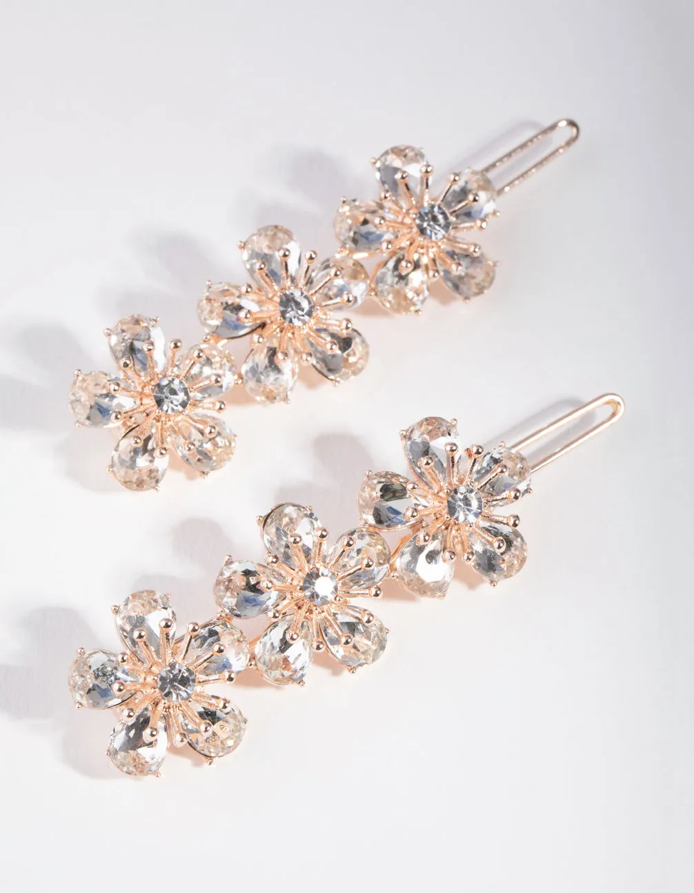 Rose Gold Diamante Trio Flower Pack Clip sold by lovisa