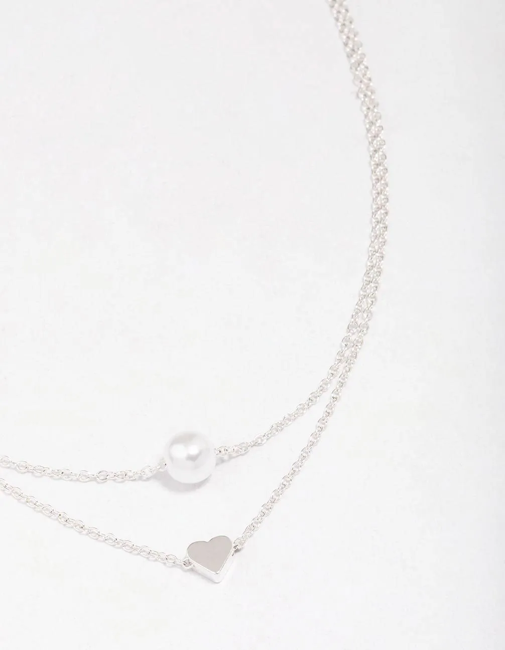 Silver Double Chain & Pearl Heart Layered Necklace sold by lovisa