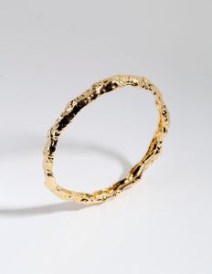 Gold Plated Textured Bangle sold by lovisa