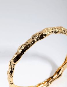 Gold Plated Textured Bangle sold by lovisa