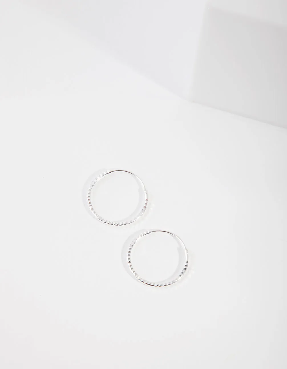 Sterling Silver 16mm Diamond Cut Hoop Earrings sold by lovisa
