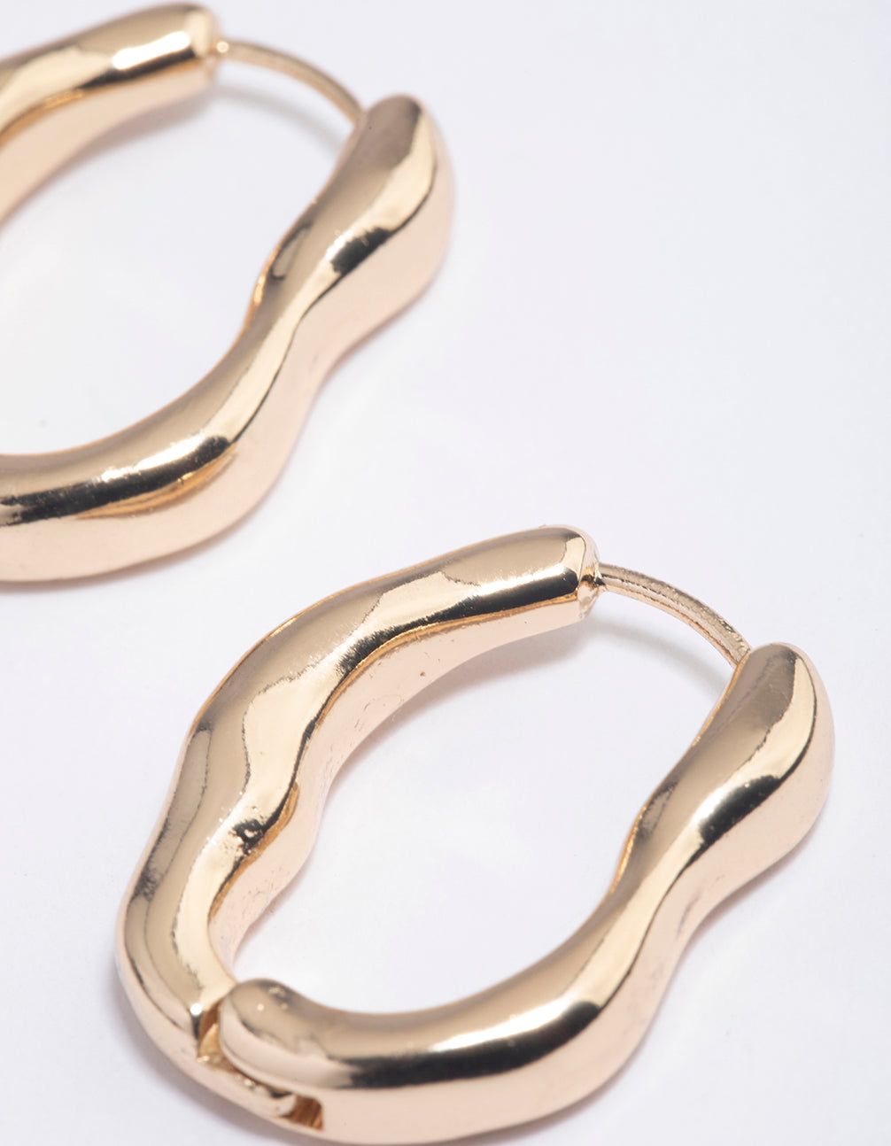 Gold Molten Oval Huggie Earrings sold by lovisa product image thumbnail 3