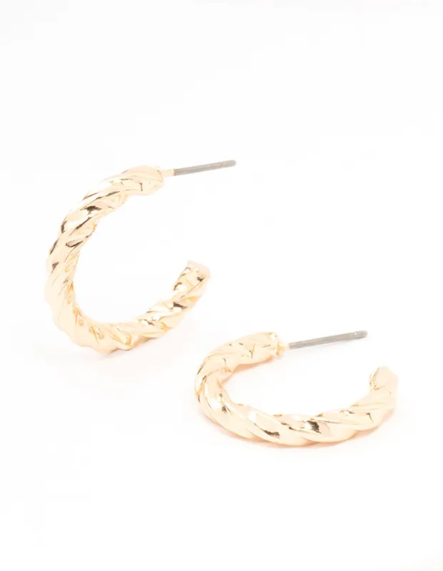 Gold Twisted Huggie Earrings sold by lovisa