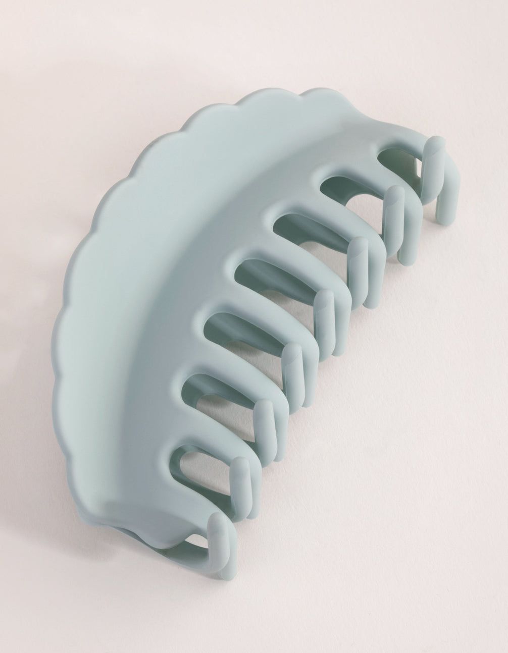 Blue Scalloped Edge Claw sold by lovisa