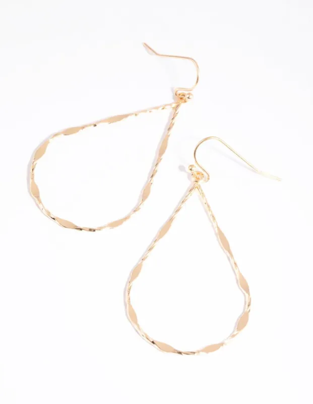 Gold Textured Oval Drop Earrings sold by lovisa