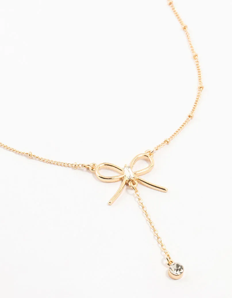 Gold Diamante Ball & Chain Bow Drop Necklace sold by lovisa