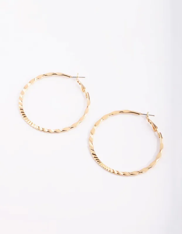 Gold Hammered Hoop Earrings sold by lovisa