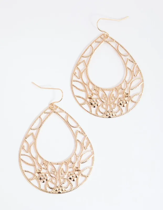 Gold Intricate Oval Drop Earrings sold by lovisa
