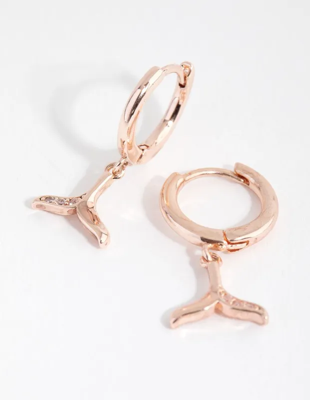 Rose Gold Diamante Whale Tail Huggie Earrings made by lovisa