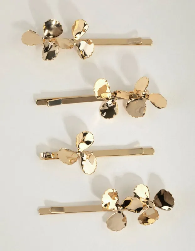 Gold Flower Hair Slides sold by lovisa
