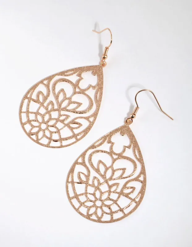 Gold Stamp Flower Drop Earrings sold by lovisa