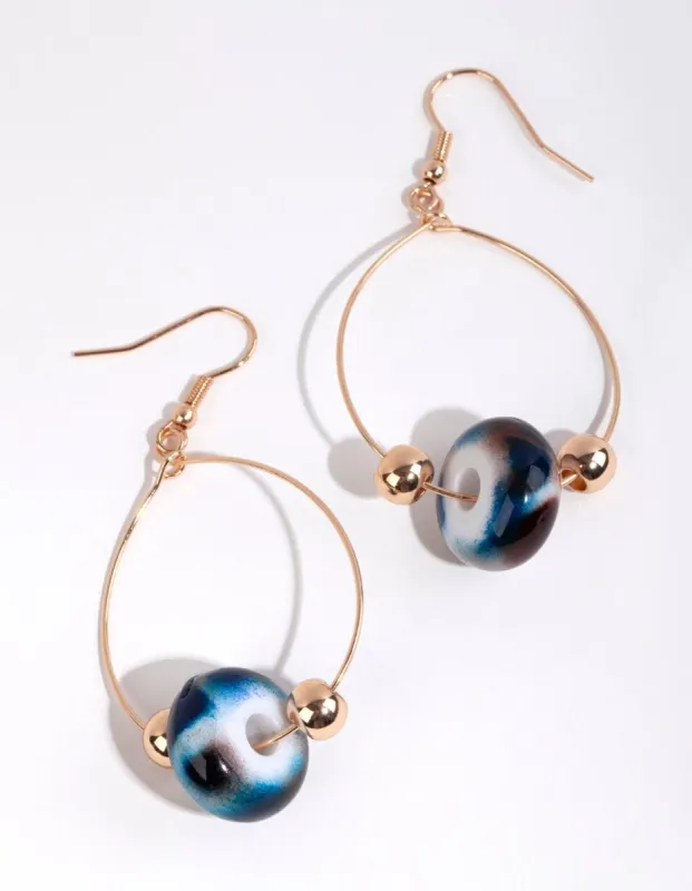Gold Ball & Blue Bead Drop Earrings sold by lovisa
