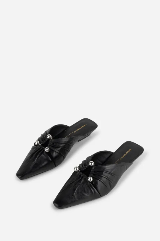 NOAH PIERCED MULE sold by Intentionally Blank