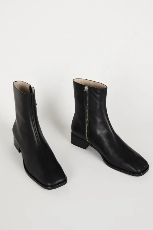 TOUR LEATHER BOOT sold by Intentionally Blank