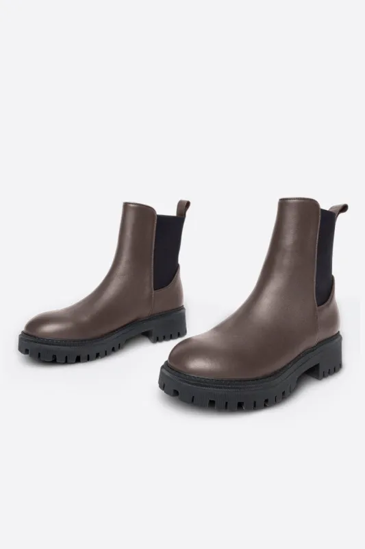 GUIDED PULL ON LUG SOLE BOOT sold by Intentionally Blank