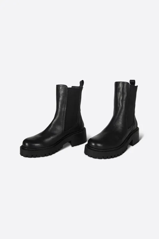 STORM FAUX FUR LINED BLACK SOLE CHELSEA BOOT made by Intentionally Blank