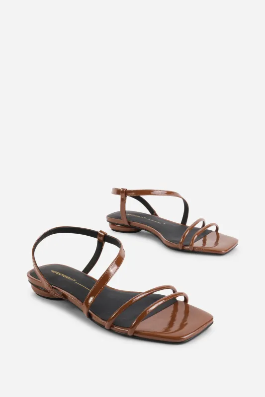 NONFICTION FLAT SANDAL sold by Intentionally Blank