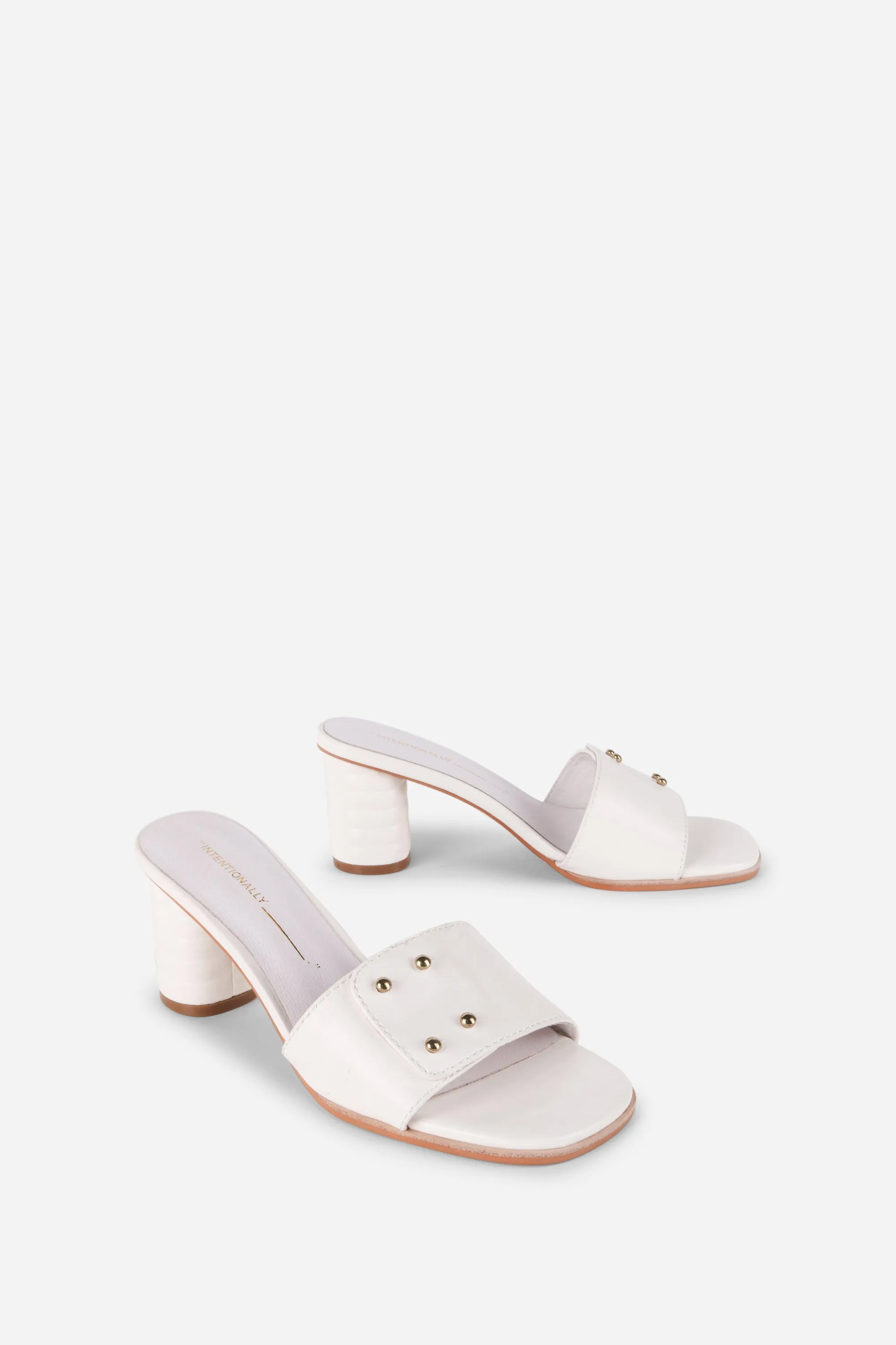 KIZMIT MULE HEEL sold by Intentionally Blank