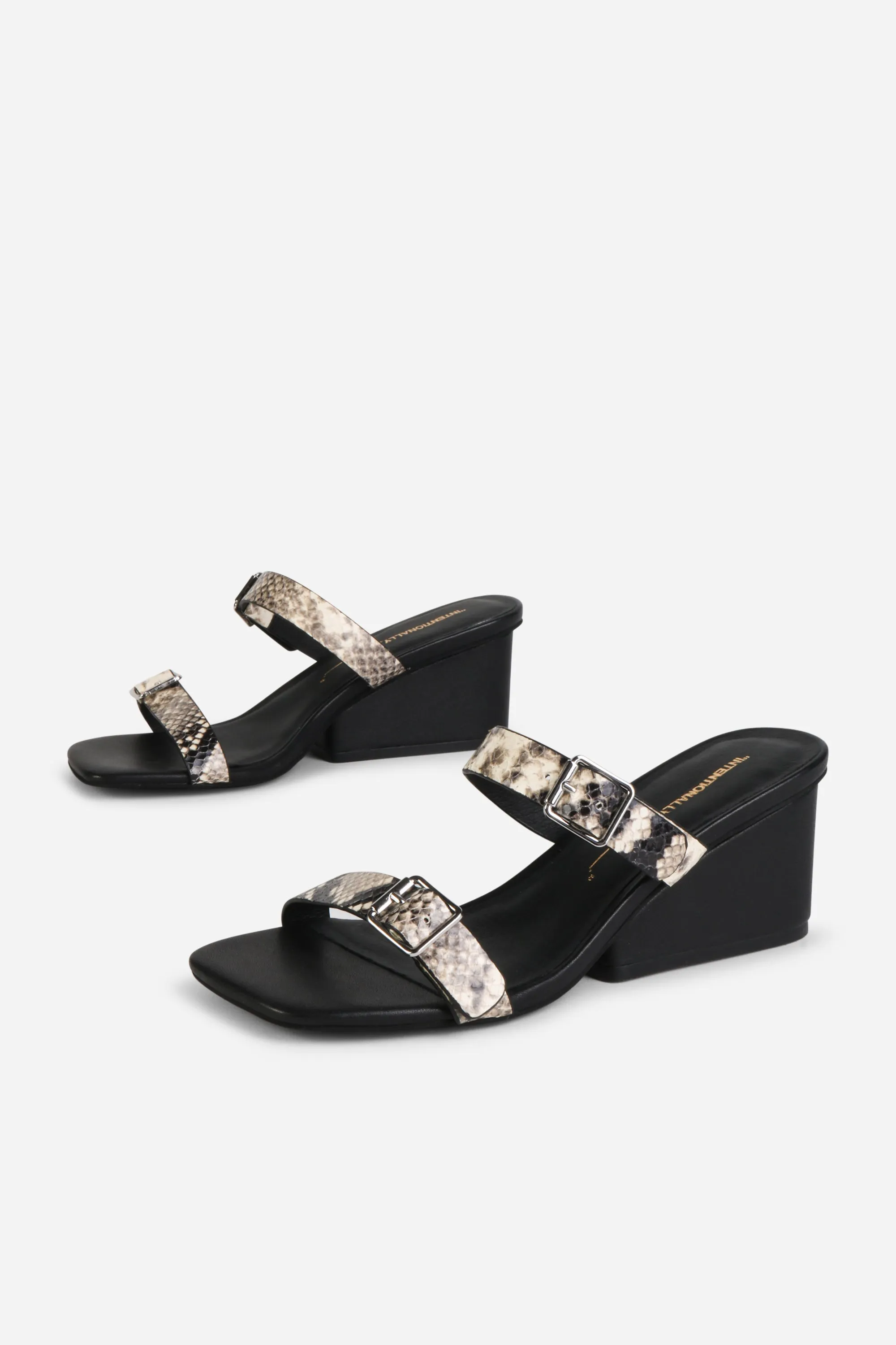 SURRENDER SNAKE EMBOSSED WEDGE HEEL sold by Intentionally Blank