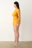 Dollar Playsuit Saffron sold by Poster Girl