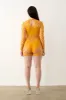 Dollar Playsuit Saffron sold by Poster Girl