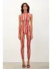 Reef Jumpsuit Burgundy Stripe sold by Poster Girl