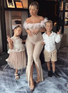 Junia Jumpsuit in Papaya Soft Pink Marabou Feathers sold by Poster Girl