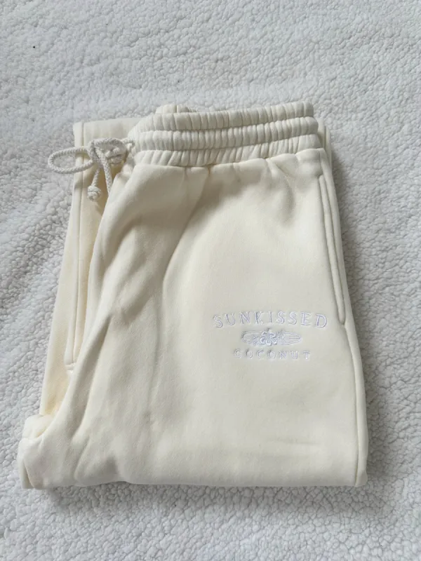Flare Logo Sweatpants sold by Sunkissed Coconut