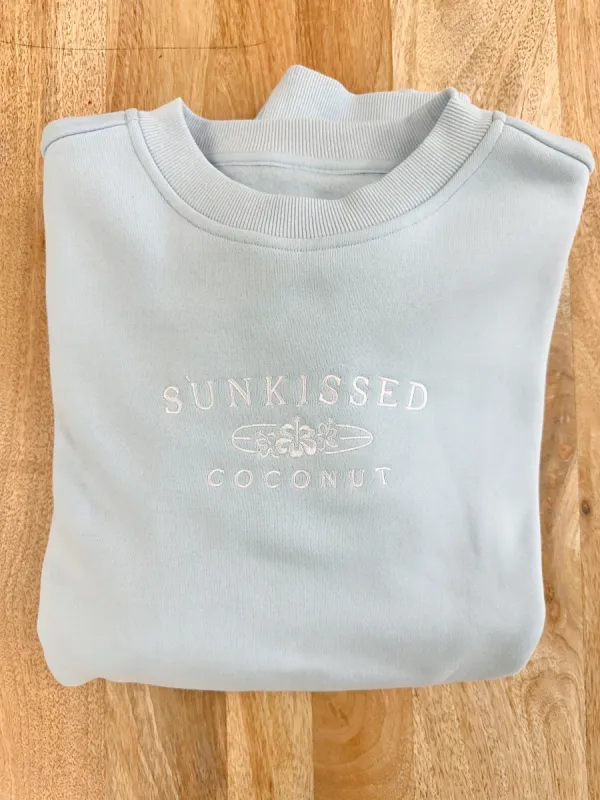 Icy Blue Sunkissedcoconut Logo Embroider Sweatshirt sold by Sunkissed Coconut