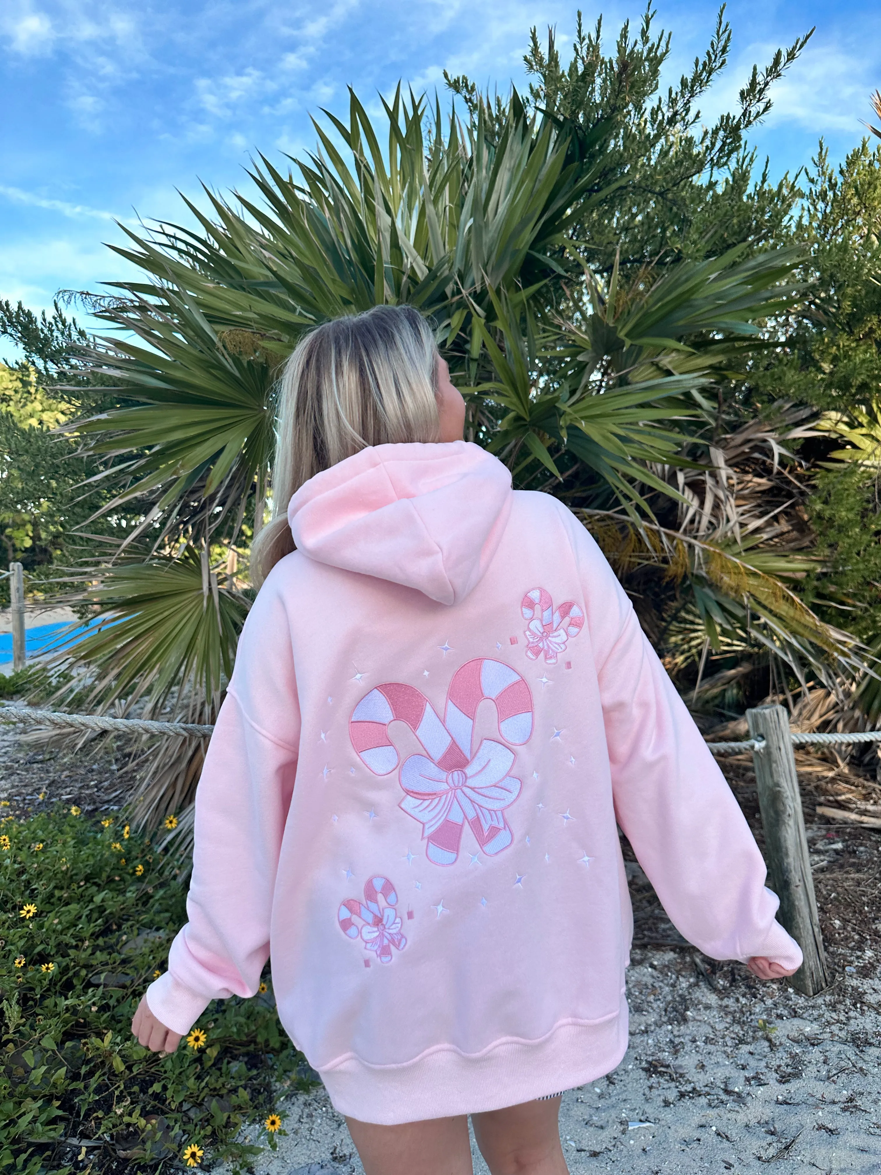 Light Pink Candy Cane Wonderland Hoodie sold by Sunkissed Coconut