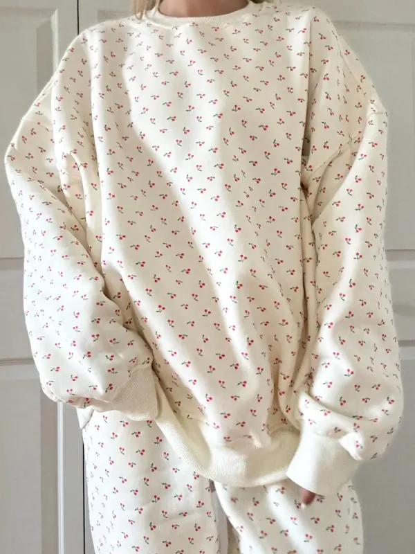 Blank Ivory Cherries All Over Sweatshirt sold by Sunkissed Coconut