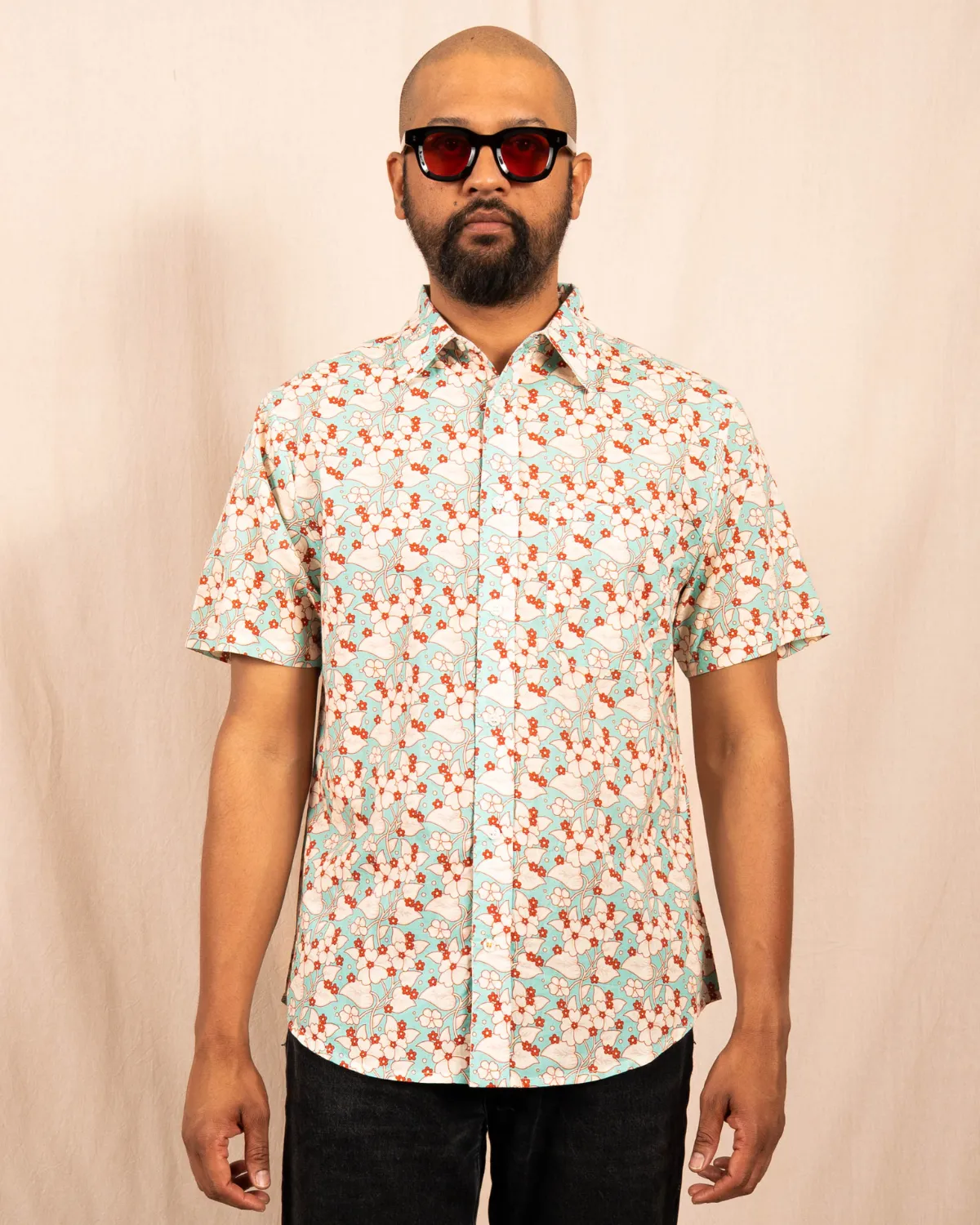 'The Folk' Shirt in Turquoise Floral Print sold by Dushyant