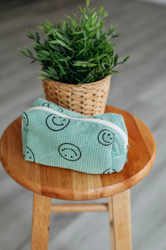 All Smiles Cosmetic Bag sold by Wild Oak Boutique